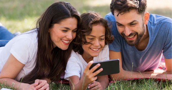 common apps that eat up data, family on phone outside